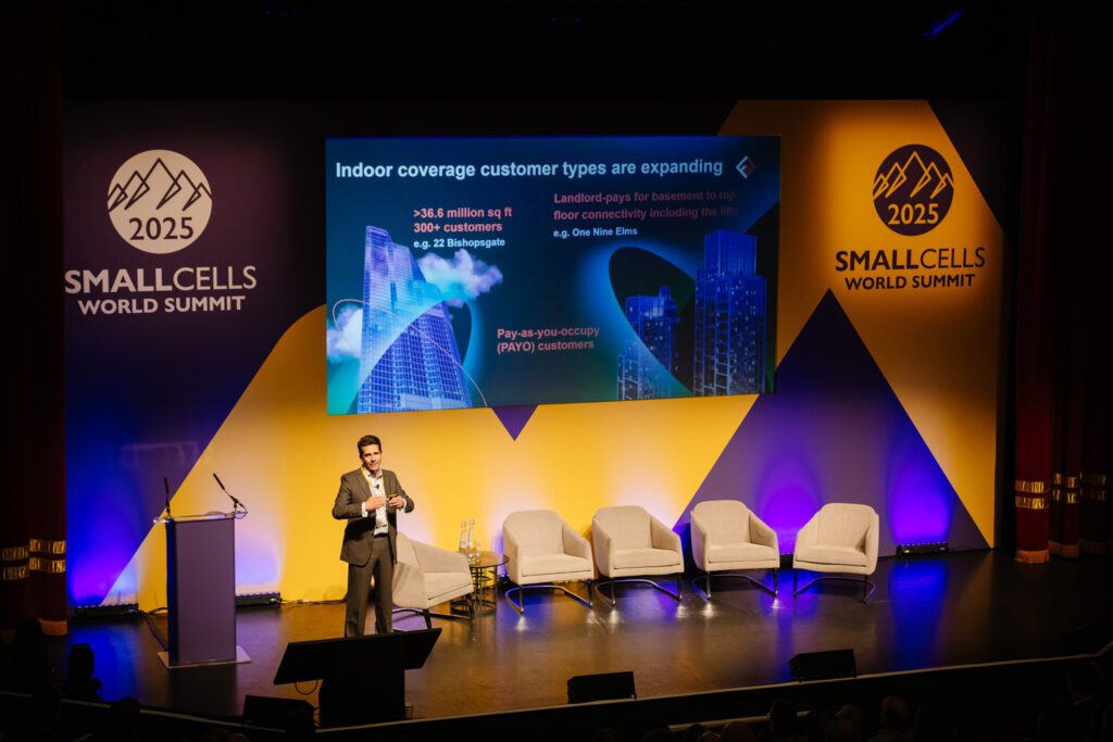 Simon Frumkin presenting on stage at the SCWS